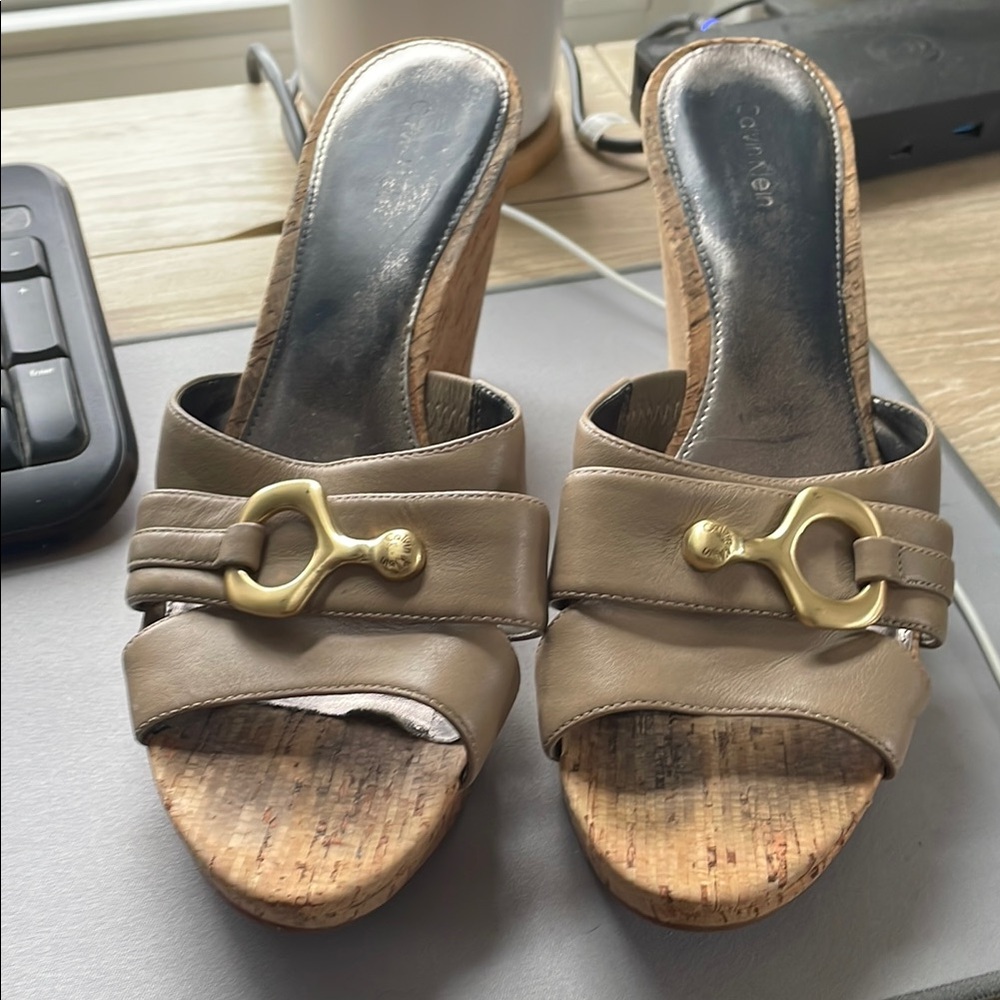 Calvin Klein beige platform sandals with gold hardware